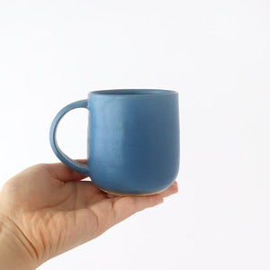 Mug blue pottery Ozenre kiln